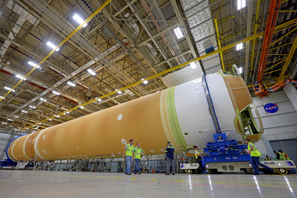 At NASA's Michoud Assembly Facility in New Orleans, Louisiana, the engine section is attached to the rest of the core stage booster for the Space Launch System's Artemis 2 rocket...on March 17, 2023.