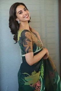 Meenakshi Chaudhary stuns in a saree at Sankranthiki Vasthunam movie interview