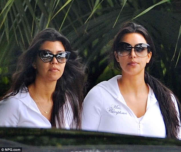 Bridetobe Kim Kardashian emerges from the Four Season hotel with sister 