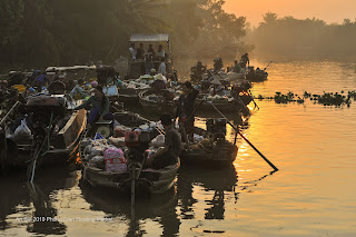 Floating market in Mekong Delta