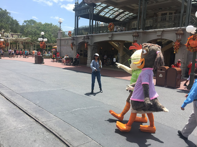 Chicken Little Pointing With Abby Mallard Characters in the Magic Kingdom Disney World