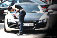 A girl with her Audi R8