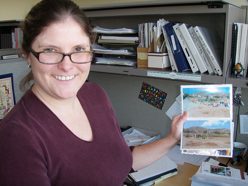 Jessica Axsom with pictures of a dig