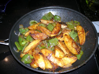 Mexican potatoes with peppers and onions