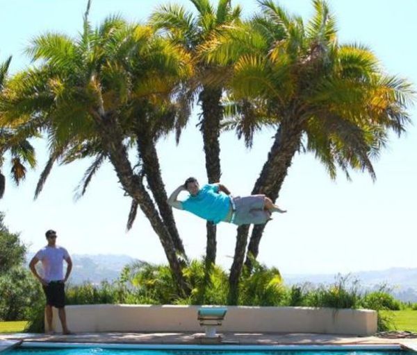 Funny Poses Above the Pool