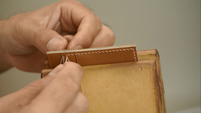 Hand stitching the card holder
