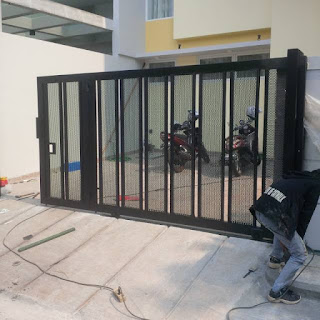 pintu dorong besi