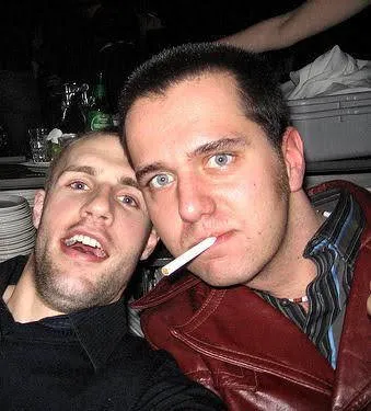 Sexy red leather jacket dude with unlit cig in mouth from Oregonlestherboy Kink Archive Database for adults over 18 years.