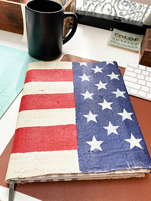 Red, white and blue journal cover and coffee mug