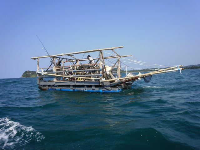 homemade party barge/fishing boat in the waters of Tela Bay, HN Images 