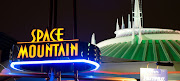 . within the Magic Kingdom theme park. Featuring lots of flashing lights, . (spacemt )