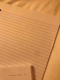 blank notebook paper and book page