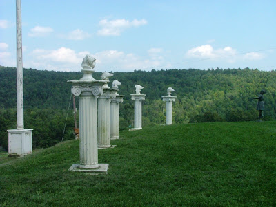 Five dog head Pillars on a hill