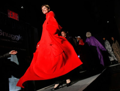 A Snuggie fashion show? What's next? A line of pencil skirts made out of ShamWow towels?