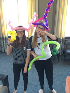 Girls with their balloon animals