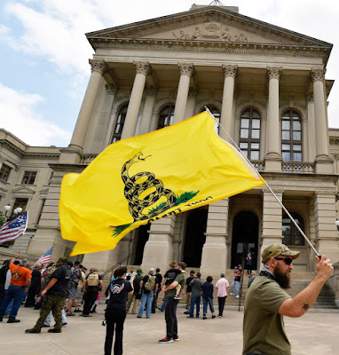 Gun rights activists rallied at state capitols across the United States carrying various firearms- rifles, handguns, placards, banners... protesting the demands for tougher gun laws following the February school shooting in Parkland, Florida, that killed 17.  One group, National Constitutional Coalition of Patriotic Americans, says organizers have permits to rally in 45 states and encouraged supporters to bring unloaded rifles in states where it’s legal.