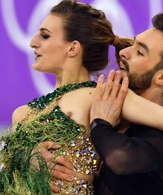 Papadakis' halter-top, complete with tassles and spangles, edged sideways to offer an unchoreographed flash of her left boob.