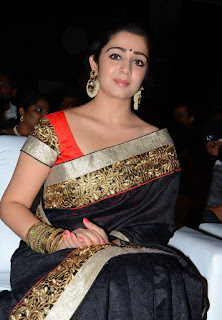 charmi new photos at jyothilakshmi audio launch