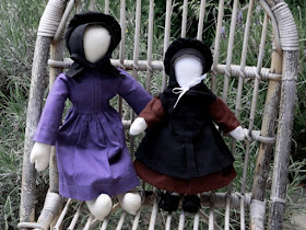 Two Amish dolls