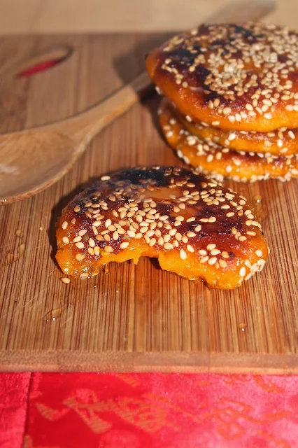 Chinese kabocha squash and sesame pancakes topped with honey.