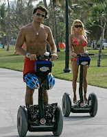 Shauna Sand And Her Airbags On A Segway 