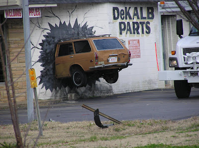 Car hit a shop