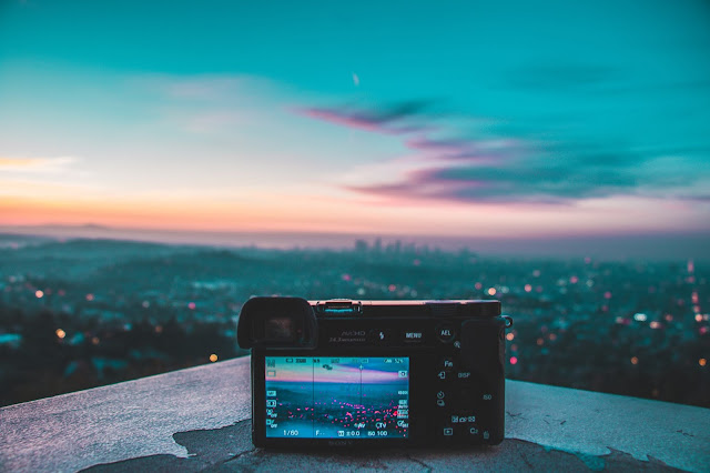 Camera cityscape at sunset - keeping valuables safe when travelling