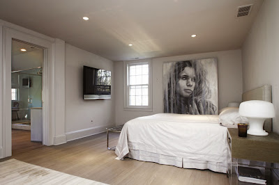 elegant and cool white master bedroom with beautiful focal point