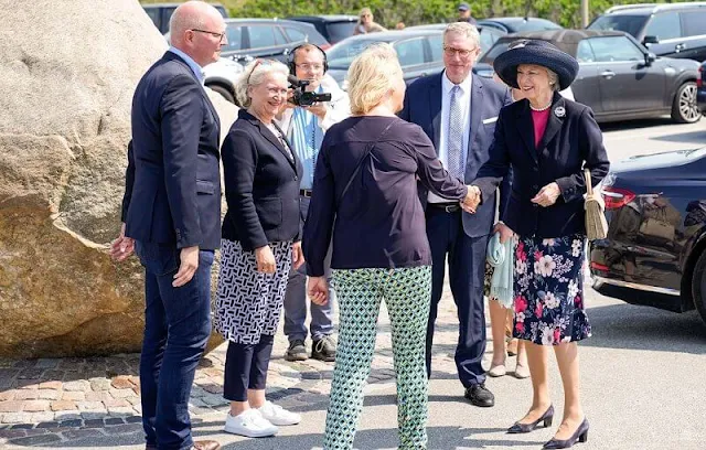 Princess Benedikte wore a black blazer and floral print skirt, and green cashmere cape. Princess Benedikte visited Old Frisian House