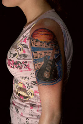 Bass guitar tattoo