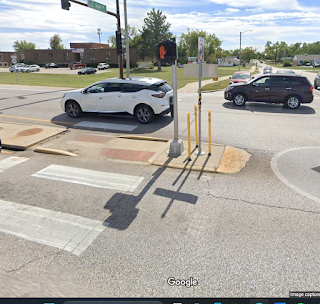 median, C Street at Collins Road NE