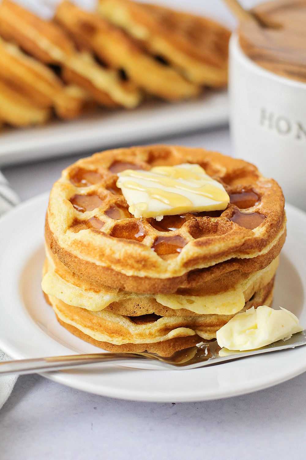 These honey cornbread waffles are made with simple ingredients, and so delicious! They're a fun and tasty twist on waffles for breakfast!