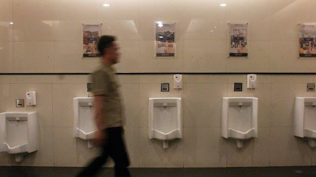 Why does Islam prohibit standing pee?