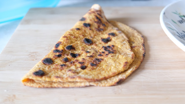 Sweet potato flatbread on a wooden chopping board