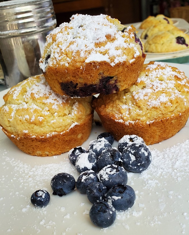 blueberry muffins with powdered sugar