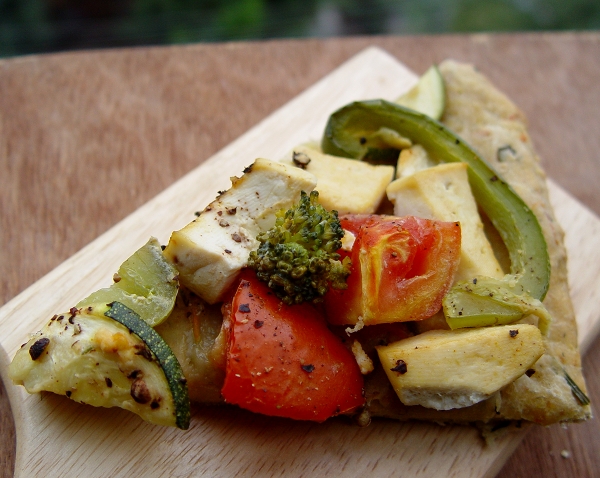 Vegan Masala Crust Pizza with Marinaded Tofu, Capsicum, Tomato, Broccoli and Zucchini
