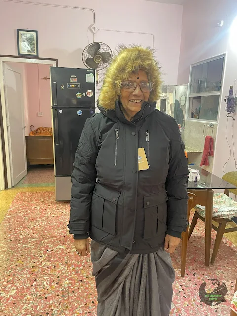 Thammi tries her new jacket on