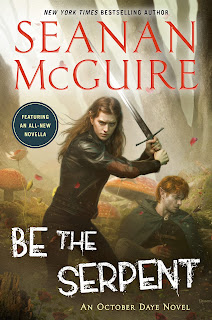 A pale woman with brown hair and wearing a leather jacket stands holding a sword, prepared to swing. A pale red-haired man is on the ground behind her, holding a hand to his side and with an arrow in his shoulder.