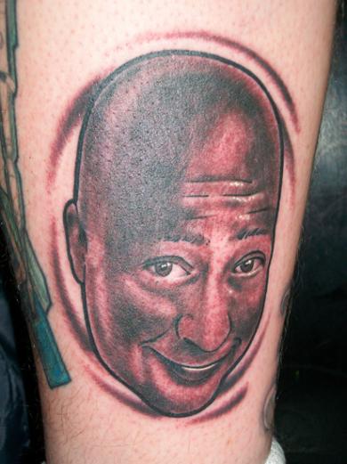 Now that's what I call one hell of a weird tattoo, methinks I am gonna keep