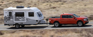 Ford Maverick with camper trailer