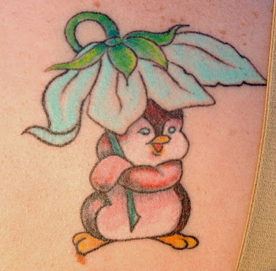 Although most tattoos are very important, penguin tattoos are a rare exception. Instead of being a bit deep and meaningful to the user, tattoos are a fun little penguin body art whimsical.  Most penguin tattoos done in cartoon style. These birds are often irresistible, even cute. These features are regularly he is their appearance or with the addition of props. For example, the penguin can be unusually large eyes, which carry a sweet expression, can be very plump bodies, and look as if they were waving around. What props, this can be something as simple as a winter cloche hat Daisy is filled to the brim, or a scarf wrapped around the neck with ease.  Tattoos cartoon penguin style does not always have to be cute. Many tattoos penguins on the basis of this creature in action, a penguin on a surfboard in water with ice in a round of fisticuffs with a polar bear, or - playing with color - an elegant top hat penguin dancing the waltz with its equivalent for women with curves.  Penguin tattoos may leave the comic book hero style and has a smoother appearance. One idea is to present an outline of the bird, perhaps filling in small elongated shapes to show its beak, flipper and part of the back. You can also create a more modern style and use of clean lines and which define the circular body, and several hues of bright blue, black and gray to give it a more dimensional. If you do not want to take everything a little kitsch, you can create a penguin robot, which could have a wide range of colors for a metallic appearance, and thus take its fins, jet explode around his cock, or even shoots lasers from his eyes.