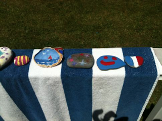 Painted shells and rock crafts are patriotic for usa 