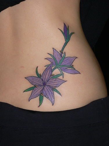 sexy side tattoos. side body tattoos. flower