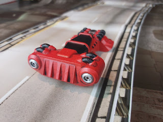 The car drives along the zoomway