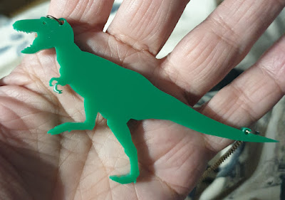 Tyrannosaurus Rex dinosaur necklace in green Perspex