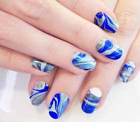 Marble nail design nail art - how to water marble nails desing - how to make marble nail design nail art - narble nail art design - how can i make a marble nail design with water - blue white marble nail design - how to make a marble nail desing with blue with and grey, how to make a marble nail design with three colors four colors 