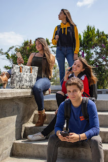 High school kids sitting on stairs