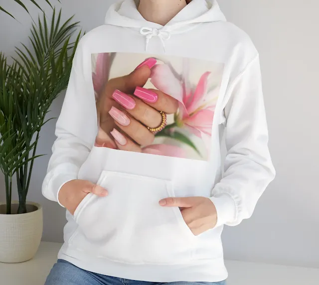 A Women Hoodie With Pink Elongated Nail Extension With Fine Glitter