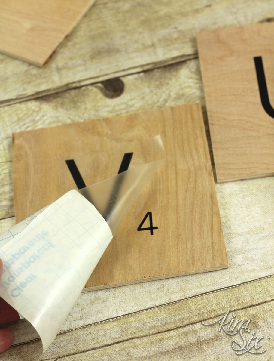 Making plywood scrabble titles with vinyl letters