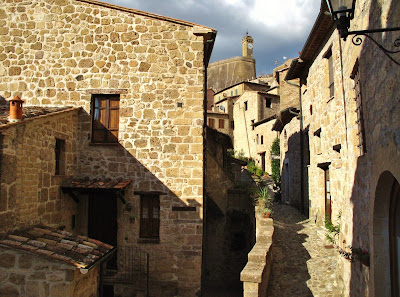 Charming streets of Sorano with Masso Leopoldino in the background, Sorano, Grossetto Province, Tuscany